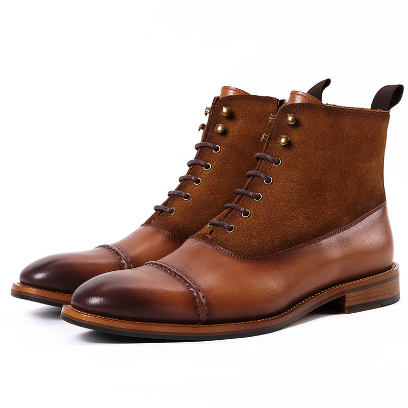 Pair of brown leather boots on a white background