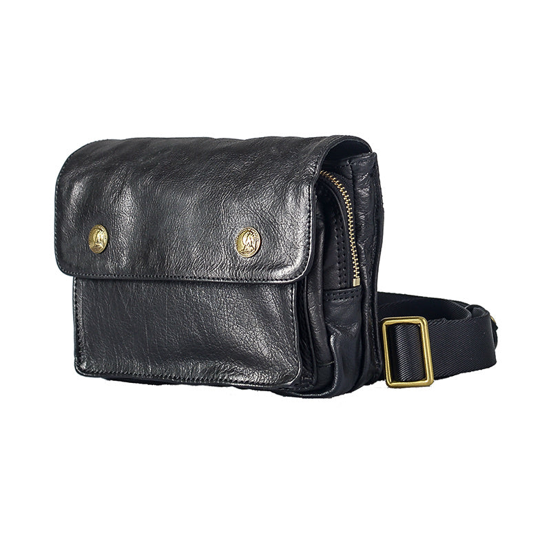 Black leather waist bag with gold accents on a white background