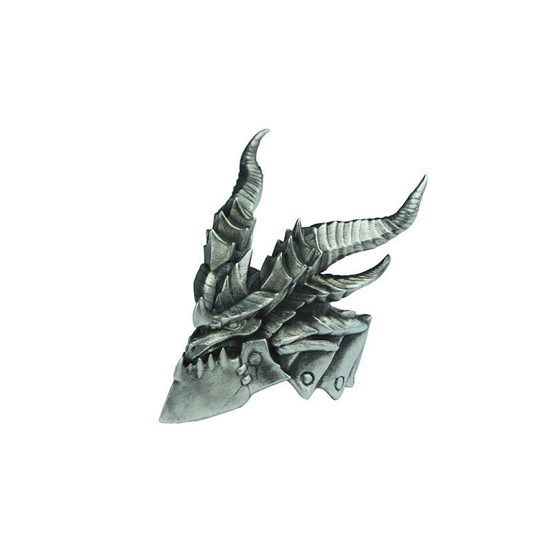Metallic dragon head sculpture on a white background