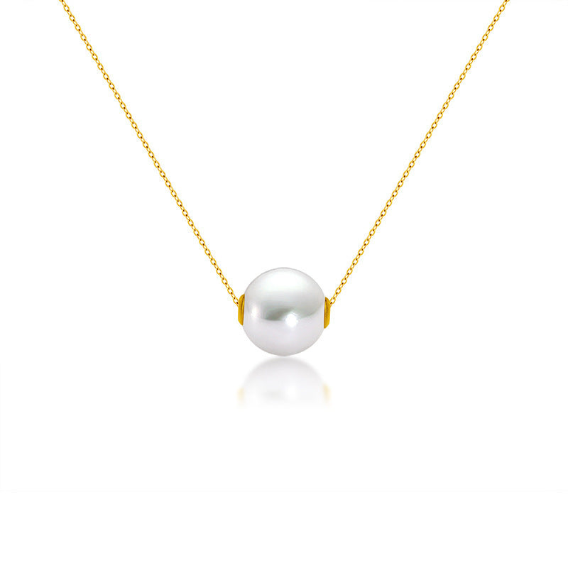 Pearl necklace with gold chain on a white background