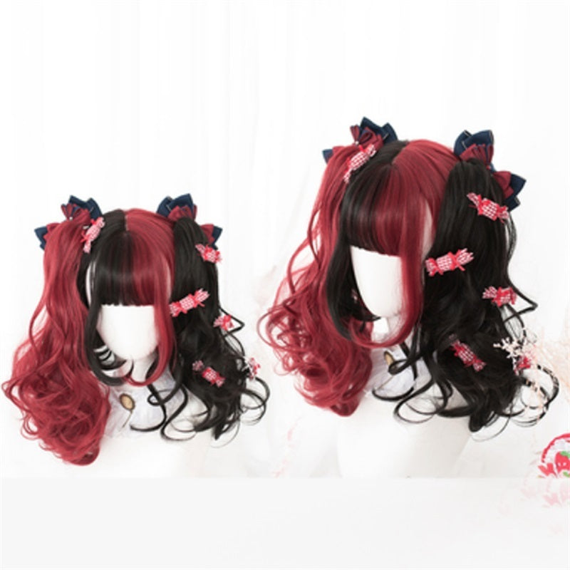 Red and black wig with decorative clips on a white background