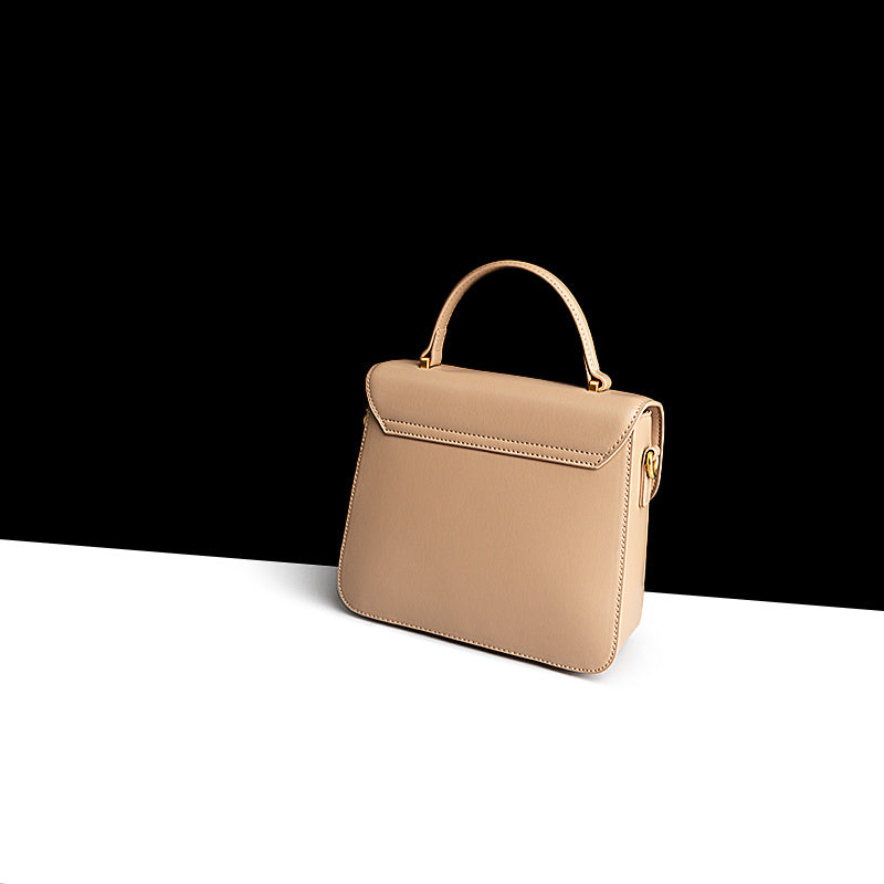 Beige handbag on a black and white background