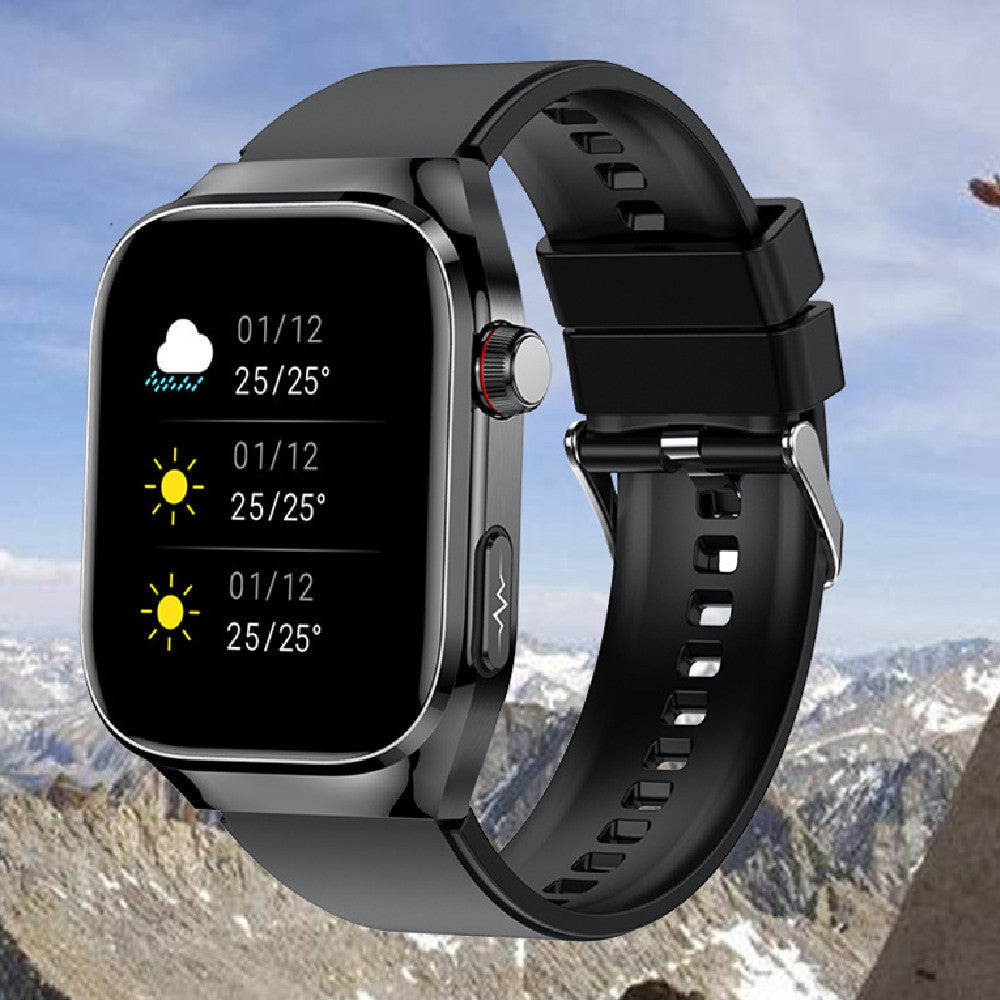 Smartwatch with a black band displayed against a mountainous landscape