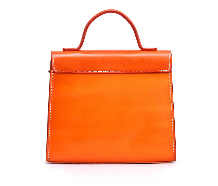 Orange handbag on a white background