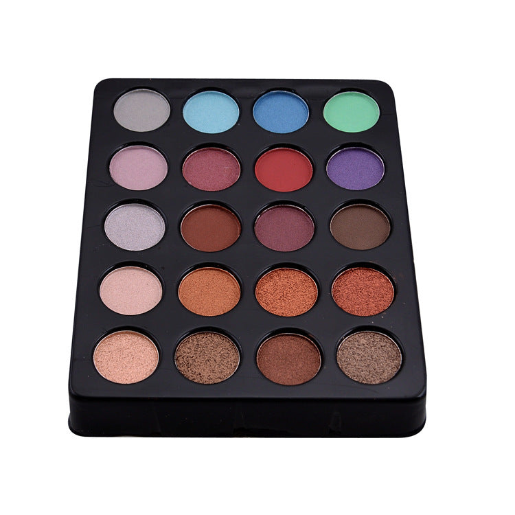 Makeup eyeshadow palette with various colors on a white background