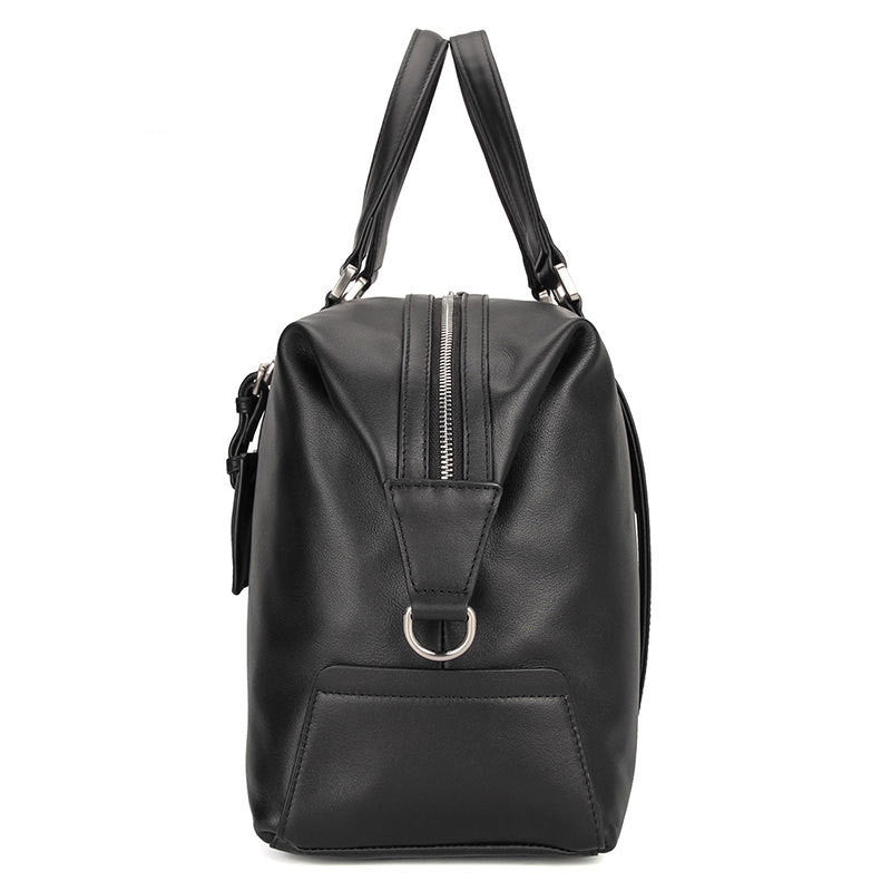 Black leather backpack with a silver zipper on a white background