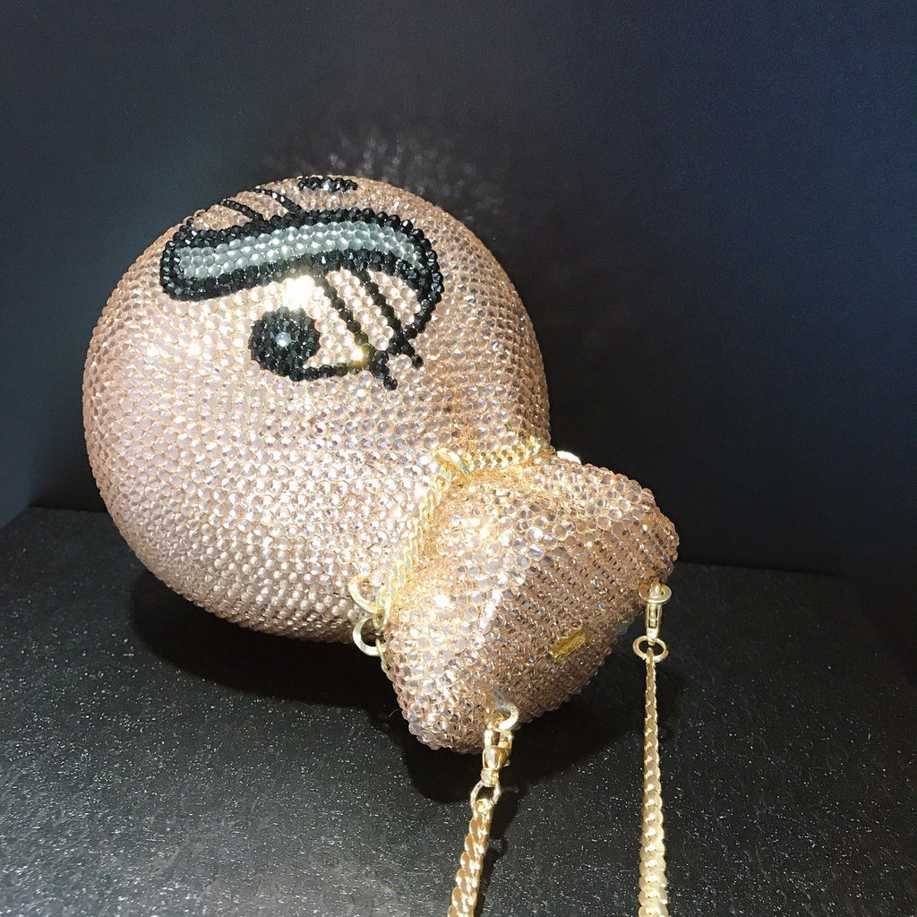 Decorative boxing glove with eye design on a dark background