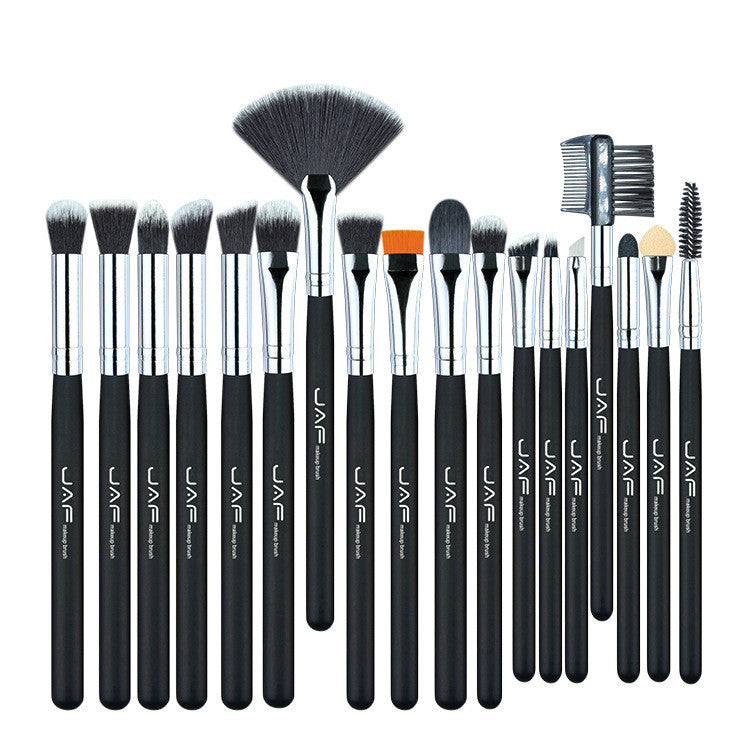 Set of 24 makeup brushes with black handles and silver ferrules on a white background.