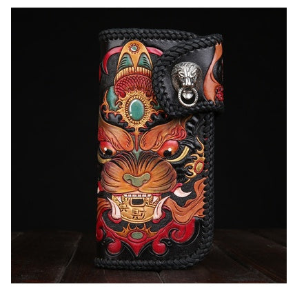 Colorful leather wallet with intricate designs on a dark background