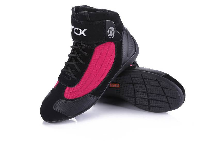 Black high-top sneakers with pink accents on a white background