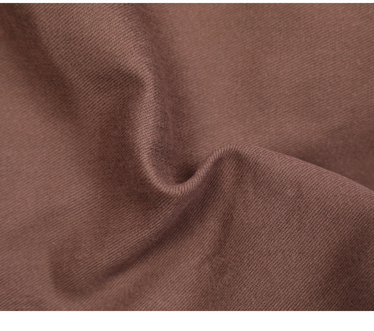 Close-up of brown fabric with visible texture