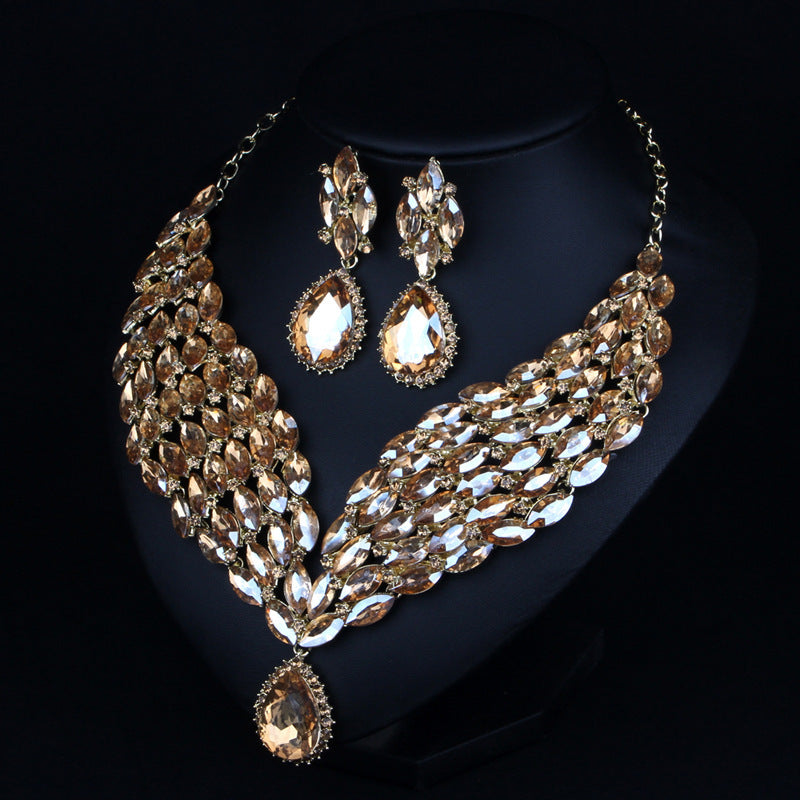 Jewelry set with necklace and earrings on a dark background