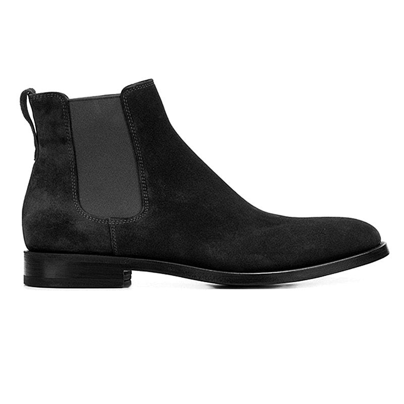 Black suede Chelsea boot on a white background