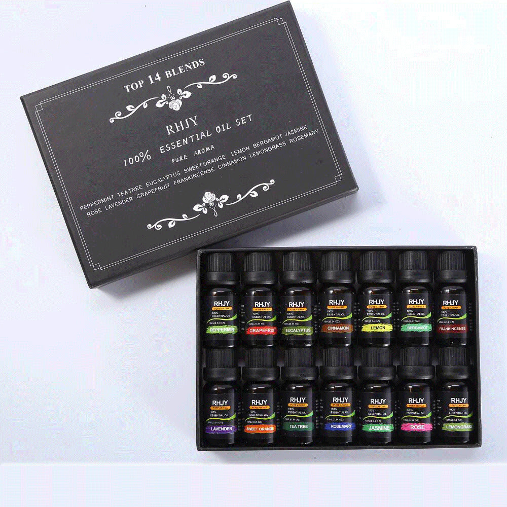 Set of essential oil bottles with a black box labeled 'Top 14 Blends' on a white background.