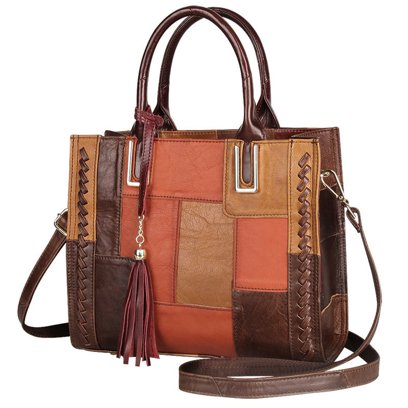 Brown leather patchwork handbag with braided details on a white background