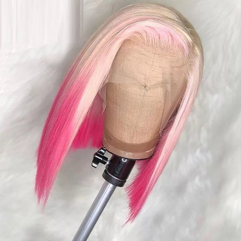 Mannequin head with pink hair on a white background