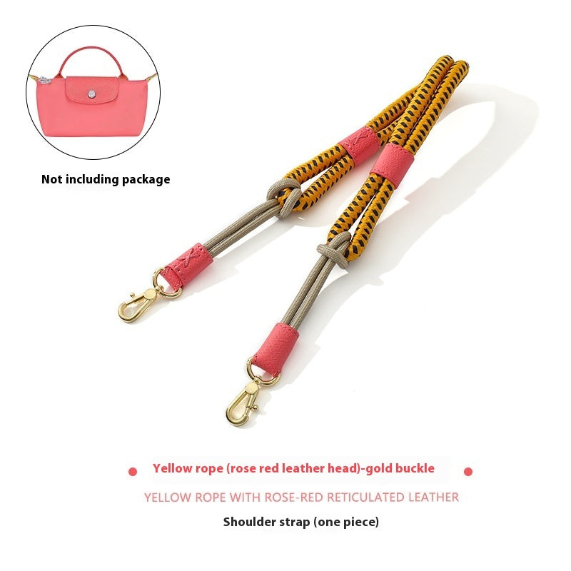 Colorful shoulder strap with rose red leather head and gold buckle on a white background