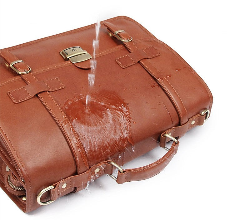 Brown leather bag with water being poured onto it on a white background
