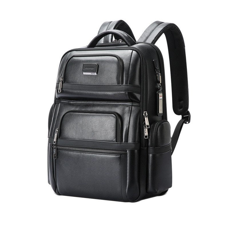 Black backpack with multiple compartments on a white background