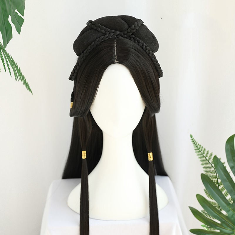 Black wig with braided top on a mannequin head against a white background with green leaves.