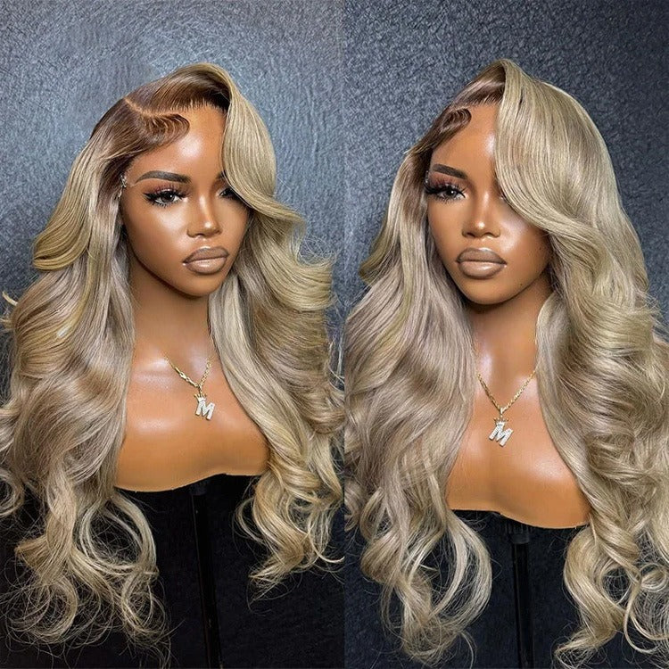Two mannequins with blonde wigs against a gray textured background