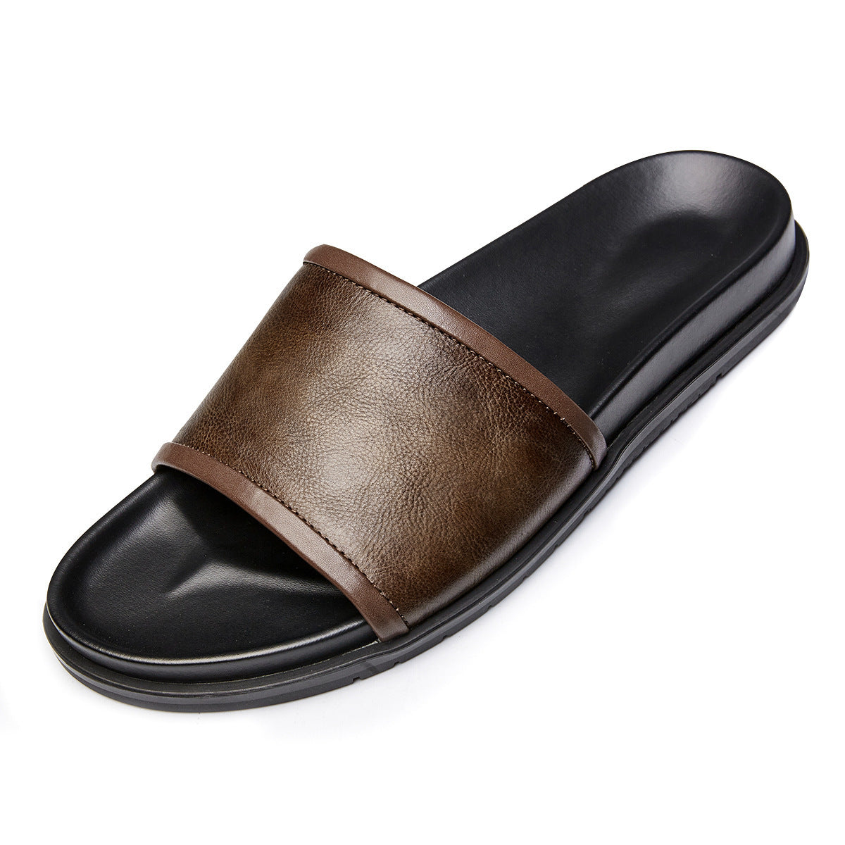 Brown sandal with black sole on a white background