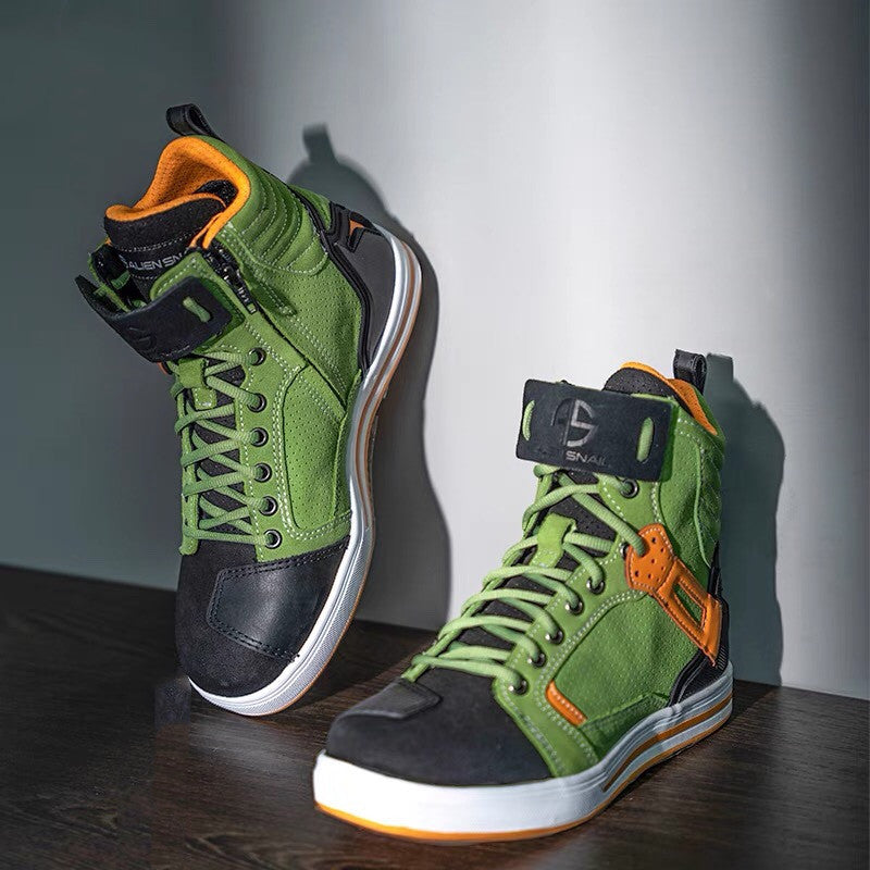 Green and black high-top sneakers with orange accents on a wooden surface.
