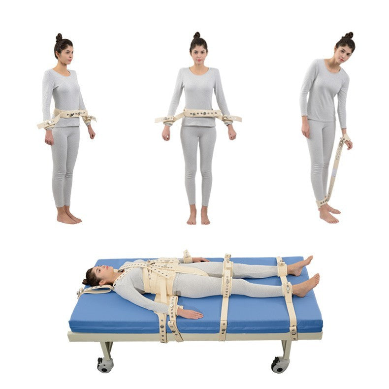 Woman demonstrating the use of a medical restraint system on a bed with a white background.