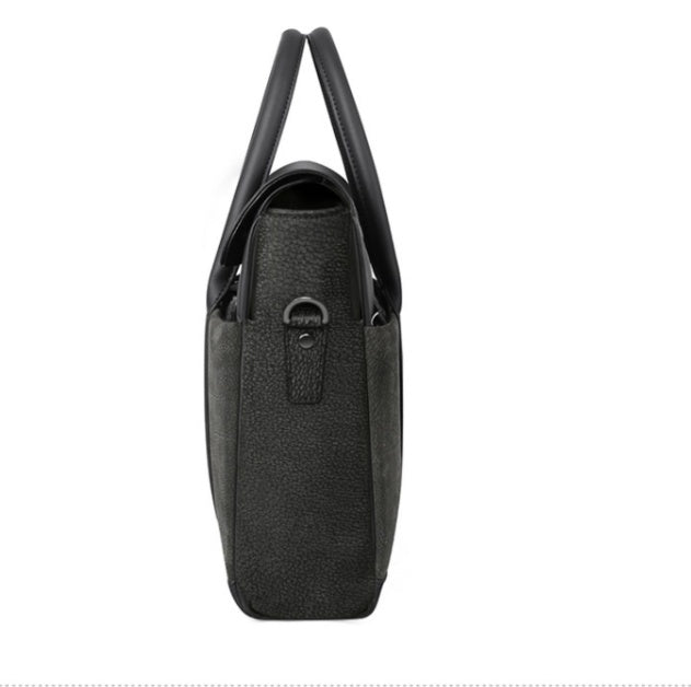 Black handbag with handles on a white background