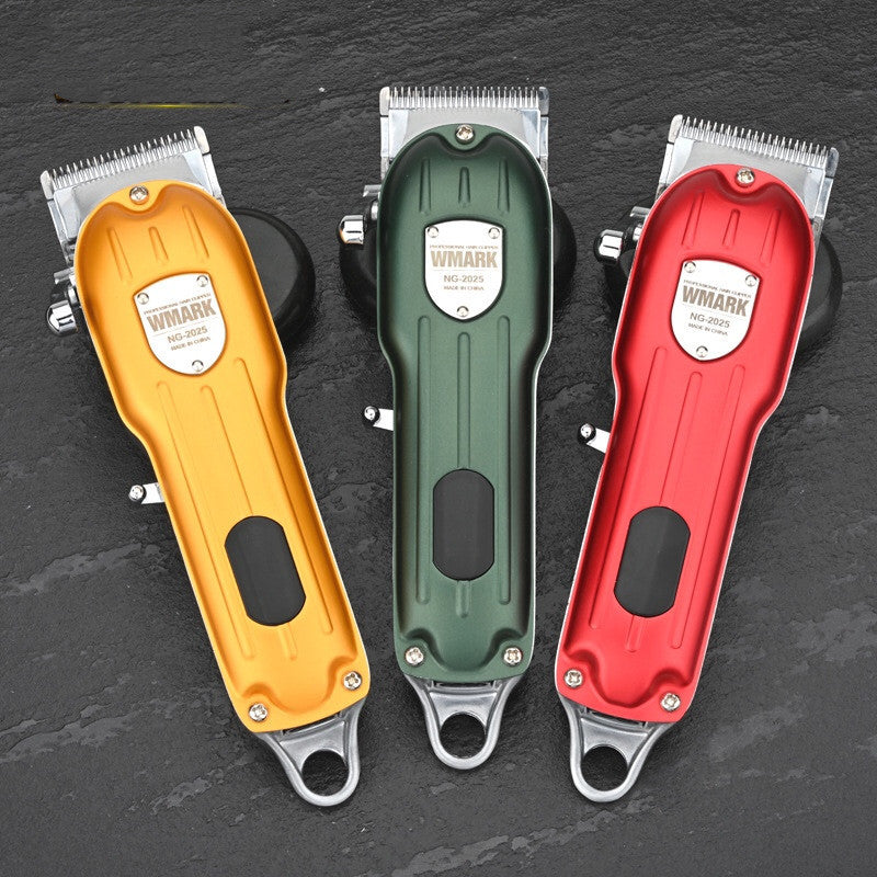 Three hair clippers in gold, green, and red on a dark background