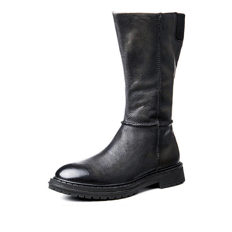 Black leather boot on a white background