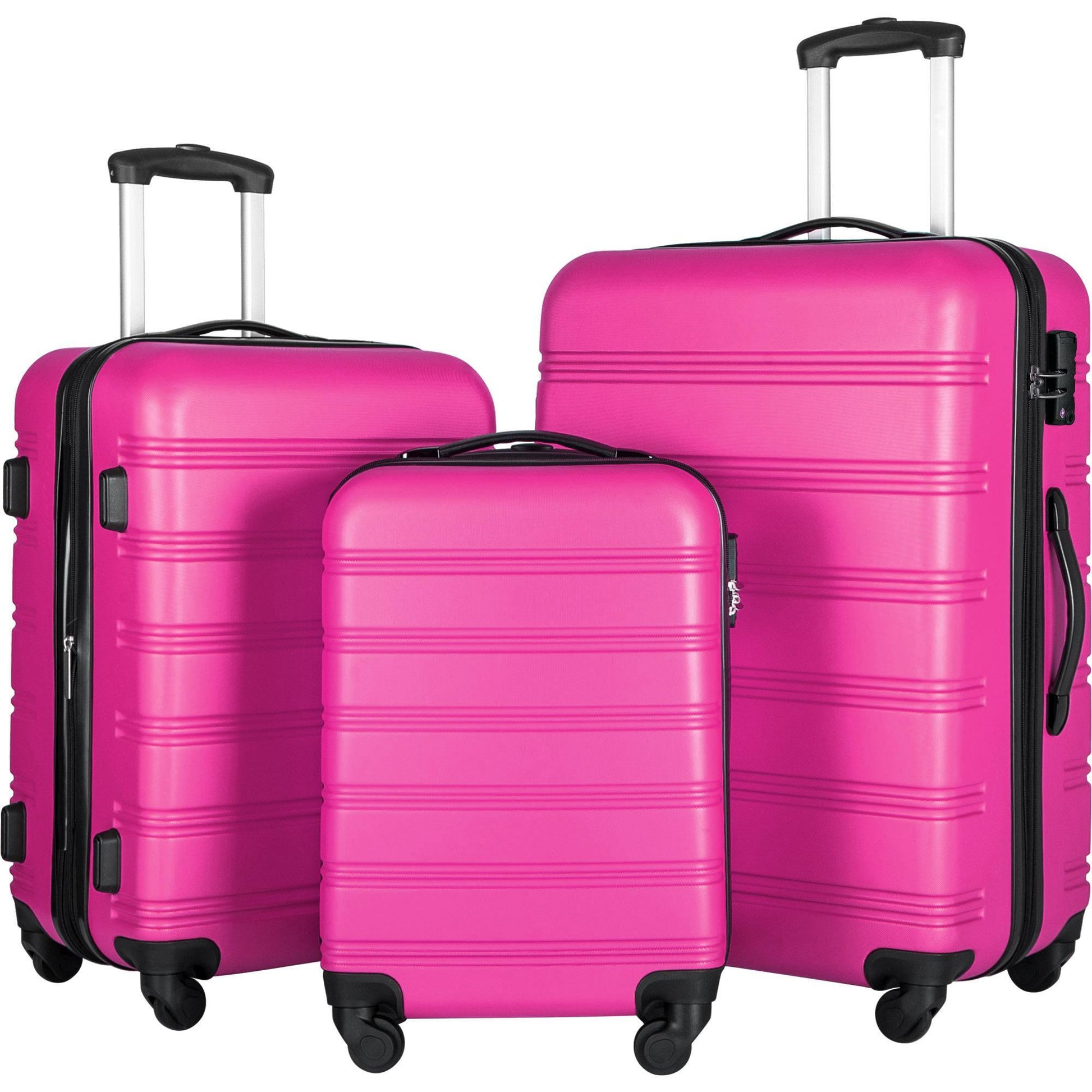 Set of three pink suitcases with black handles and wheels on a white background