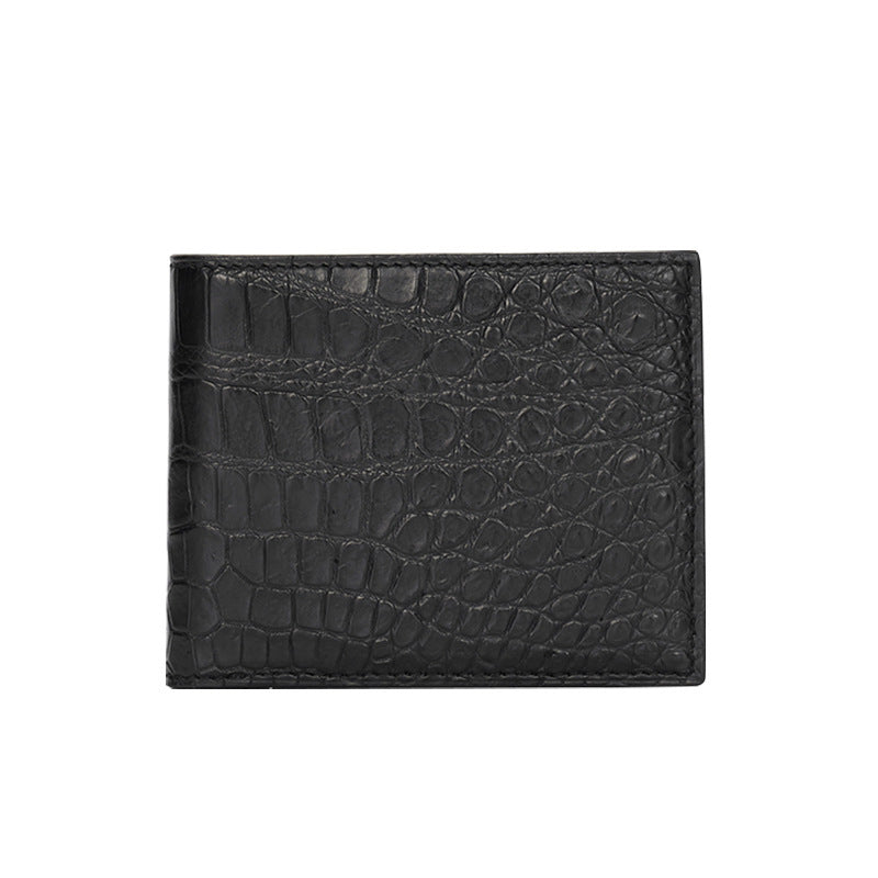 Black crocodile patterned wallet on a white background