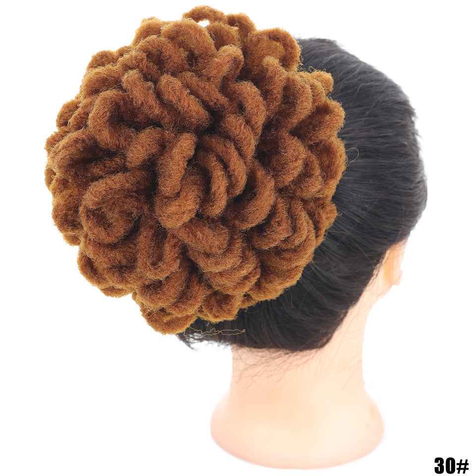Brown knitted headband on a mannequin head with a white background