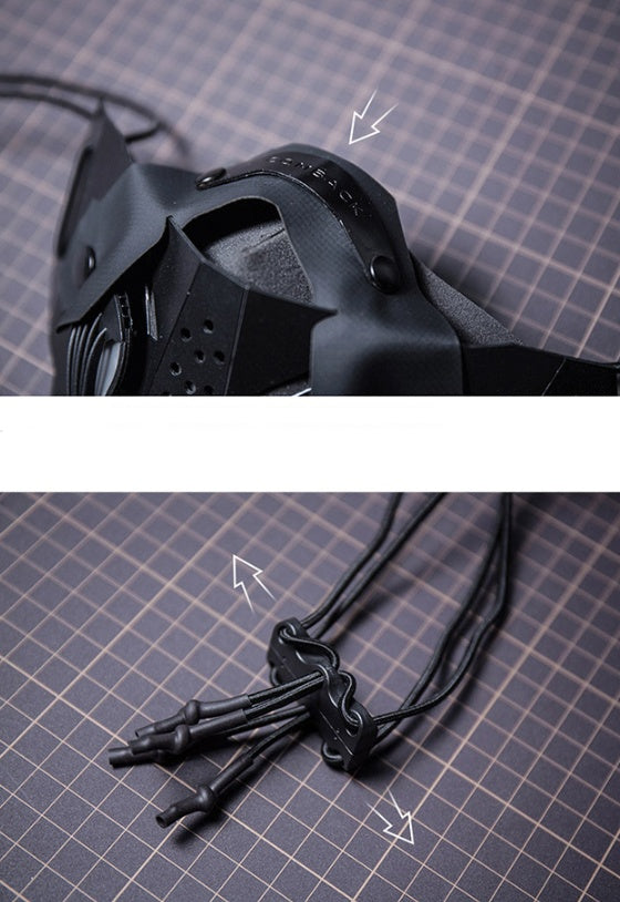 Black mask with chin strap on a grid background