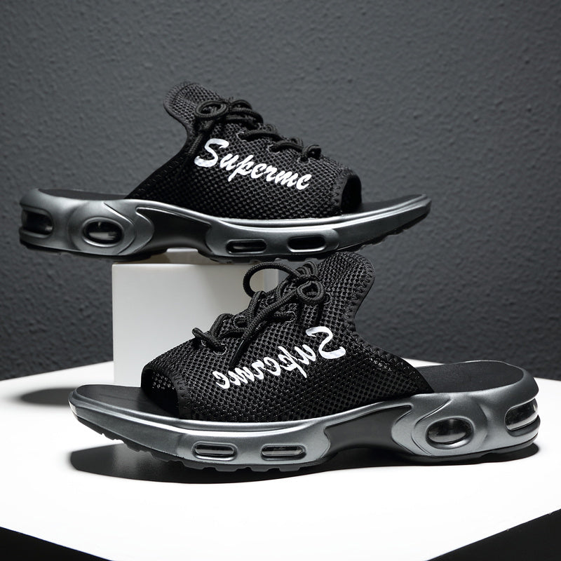 Black sneakers with 'Supreme' and 'Supreme 2' text on a dark gray background