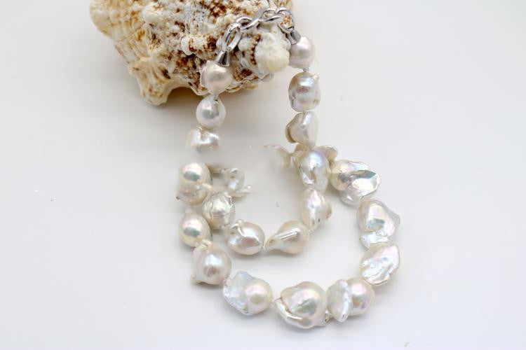 Pearl necklace on a white background