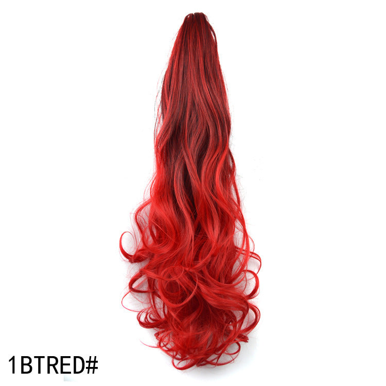 Red hair extension on a white background