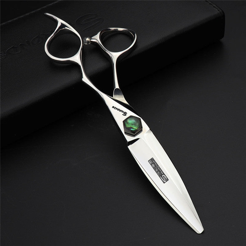 Stainless steel scissors with a dark background