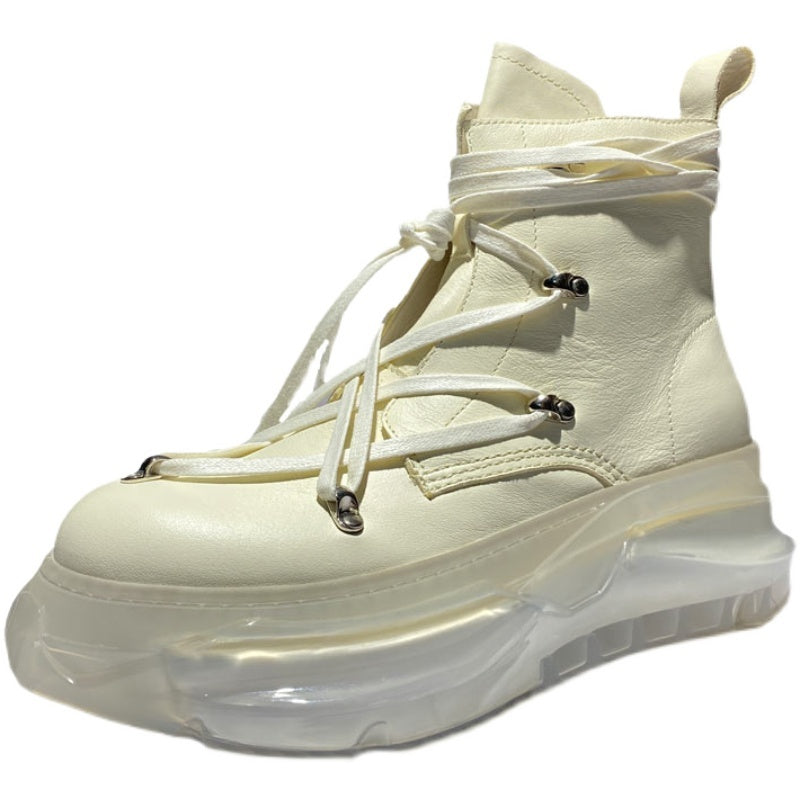 White high-top sneaker with thick sole on a white background