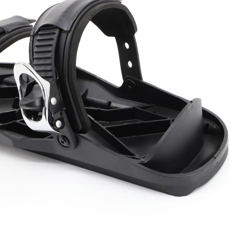 Black snowboard binding on a white background