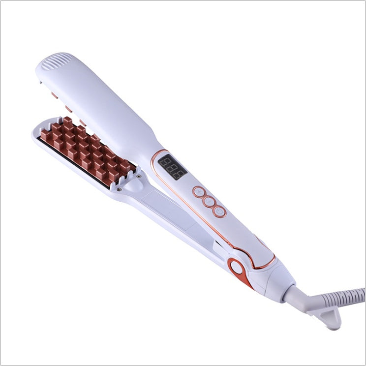 White hair straightener with copper发热片 on a white background