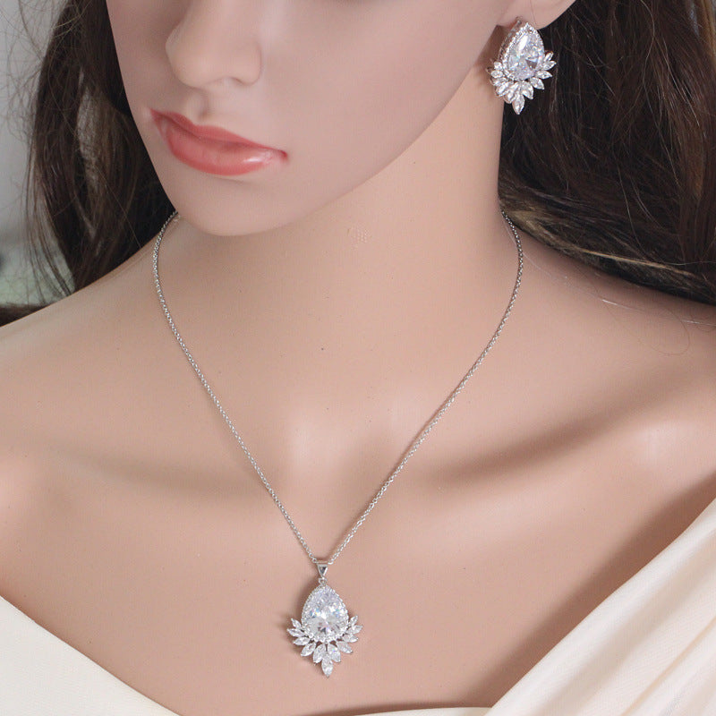 Jewelry set with necklace and earrings on a mannequin