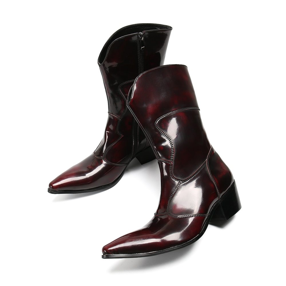 Shiny burgundy boots on a white background