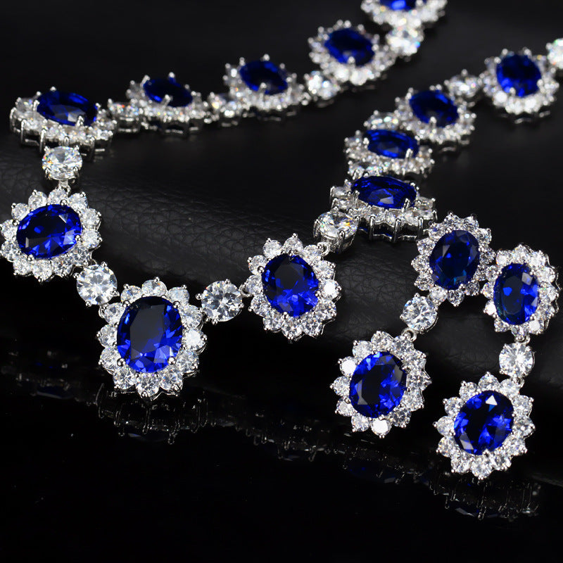 Necklace with blue gemstones on a black background