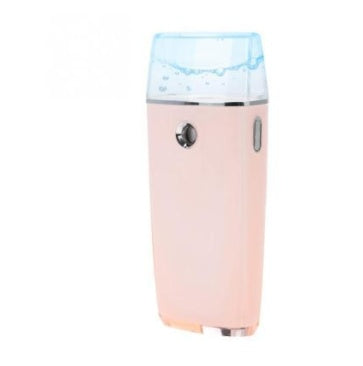 Pink humidifier with a blue light on a white background