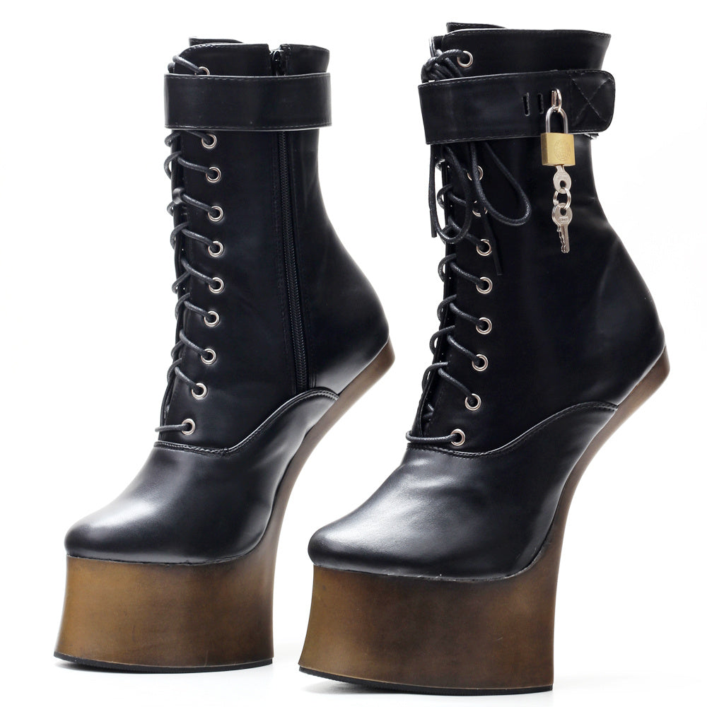 Black platform boots with a lock on a white background