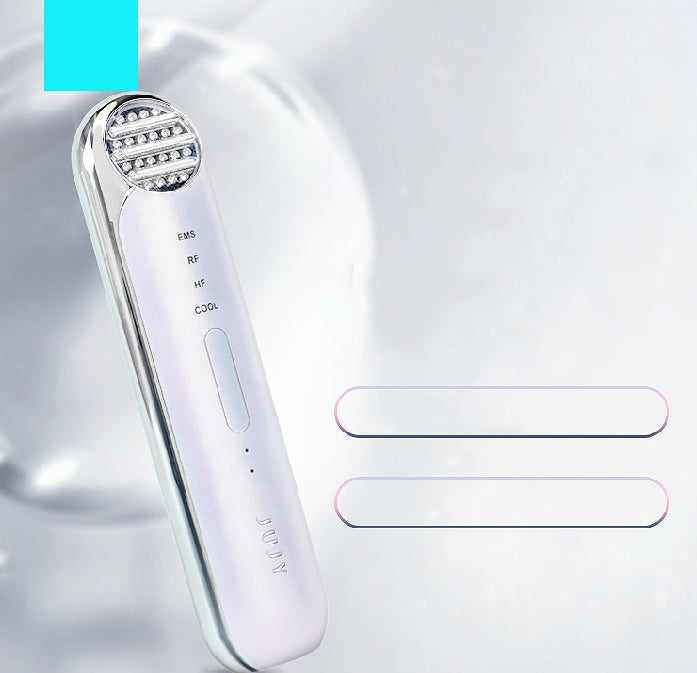 White electronic device with control panel on a light gray background