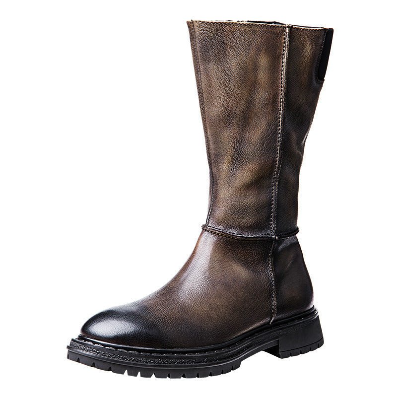 Brown leather boot on a white background
