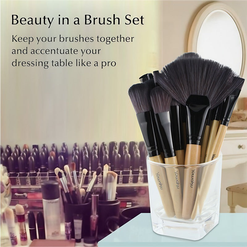Set of makeup brushes in a clear holder with text 'Beauty in a Brush Set' on a blurred background.